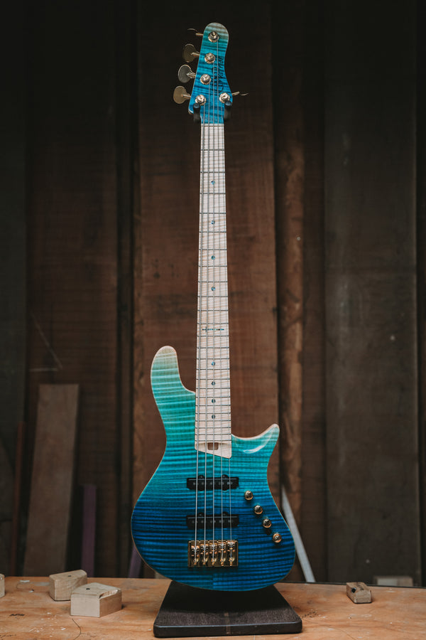 Warrior Isla J Ocean Blue Fade Flame 5 string NEW